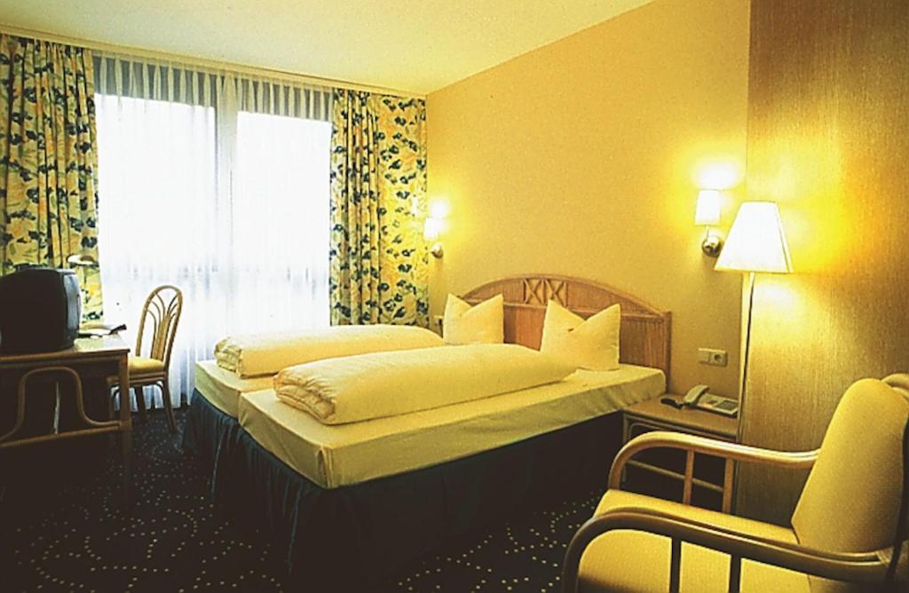 Hotel & Restaurant Hessischer Hof Ober-Ramstadt Pokoj fotografie